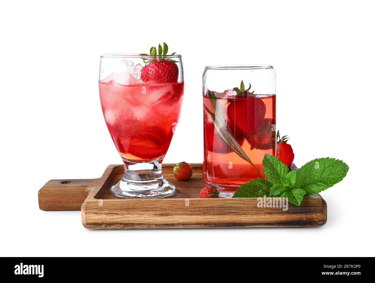 Glass of infused water with strawberry and mint on white background ...