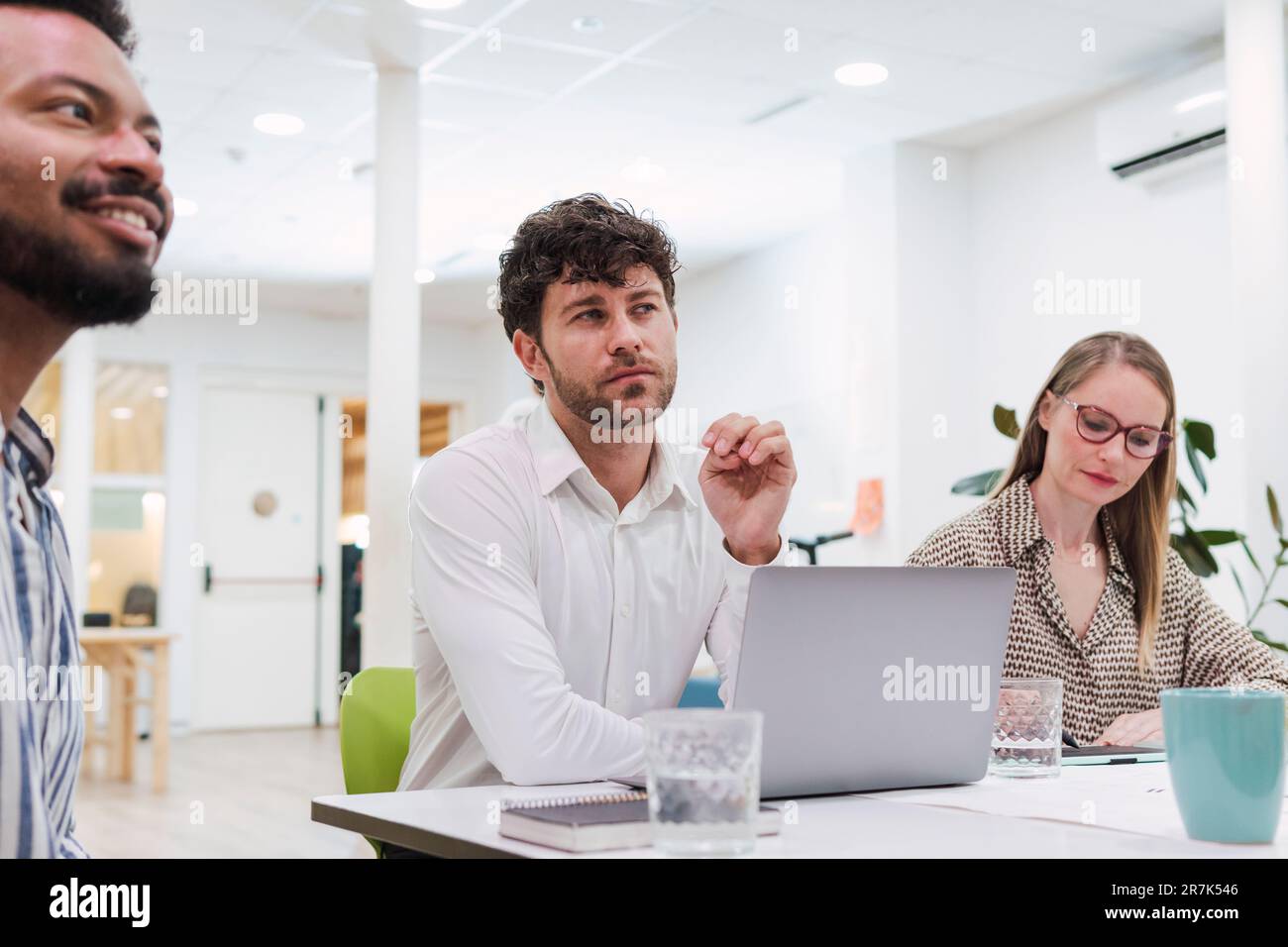 Business colleagues attending a presentation in office Stock Photo