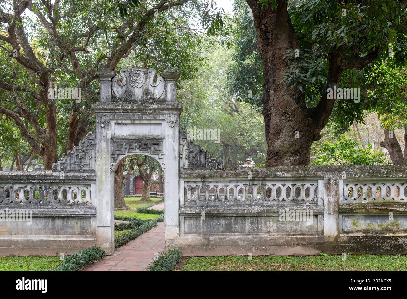 View of garden and walls of the inner courtyard in the Temple of Literature, Hanoi, Vietnam dedicated to Confucius and the Imperial Academy Stock Photo
