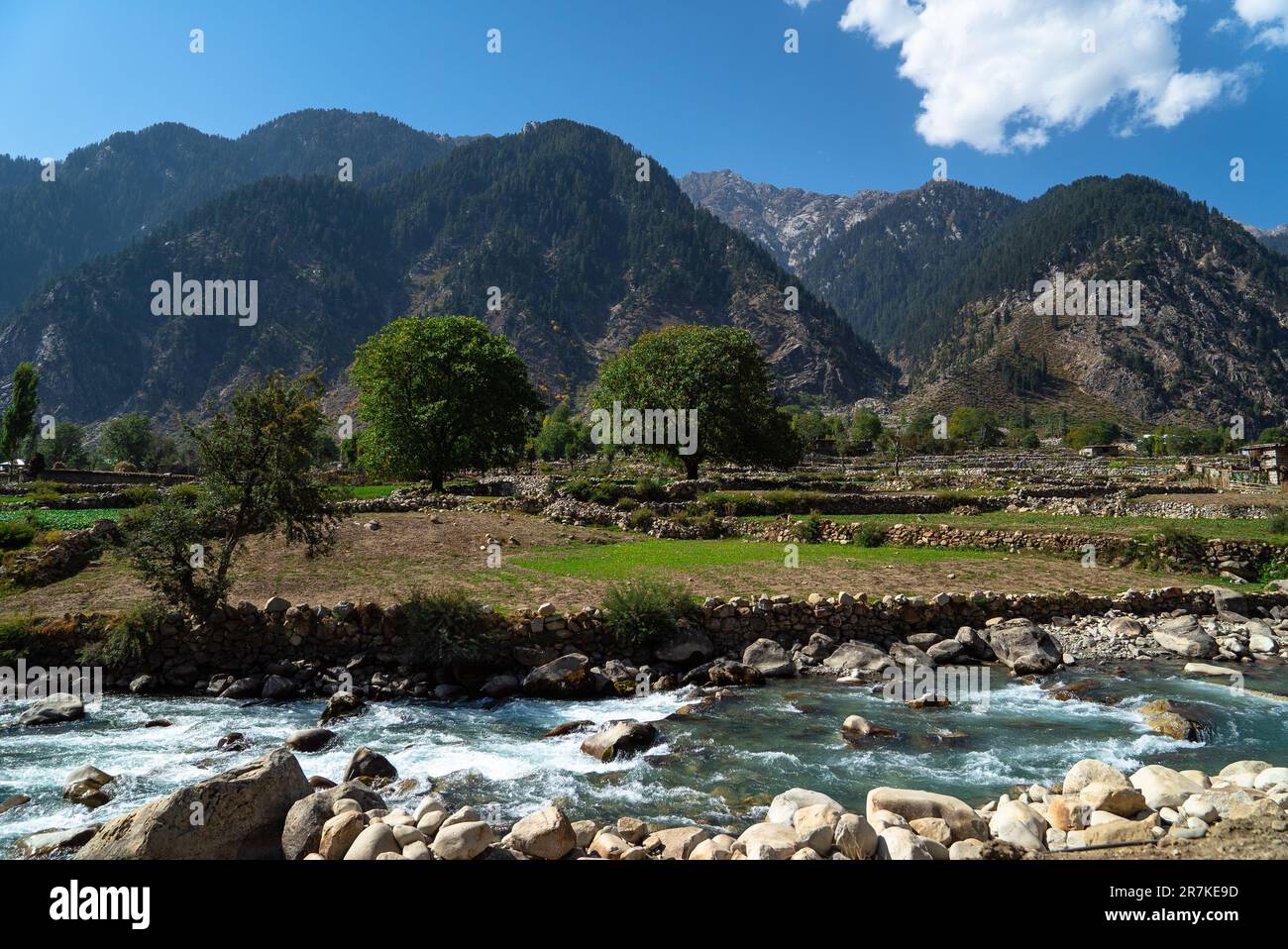 Kumrat Valley, The Panjkora River, Which Originates in the Hindu Kush Mountains, Runs Through Kumrat Valley, Pakistan. Stock Photo