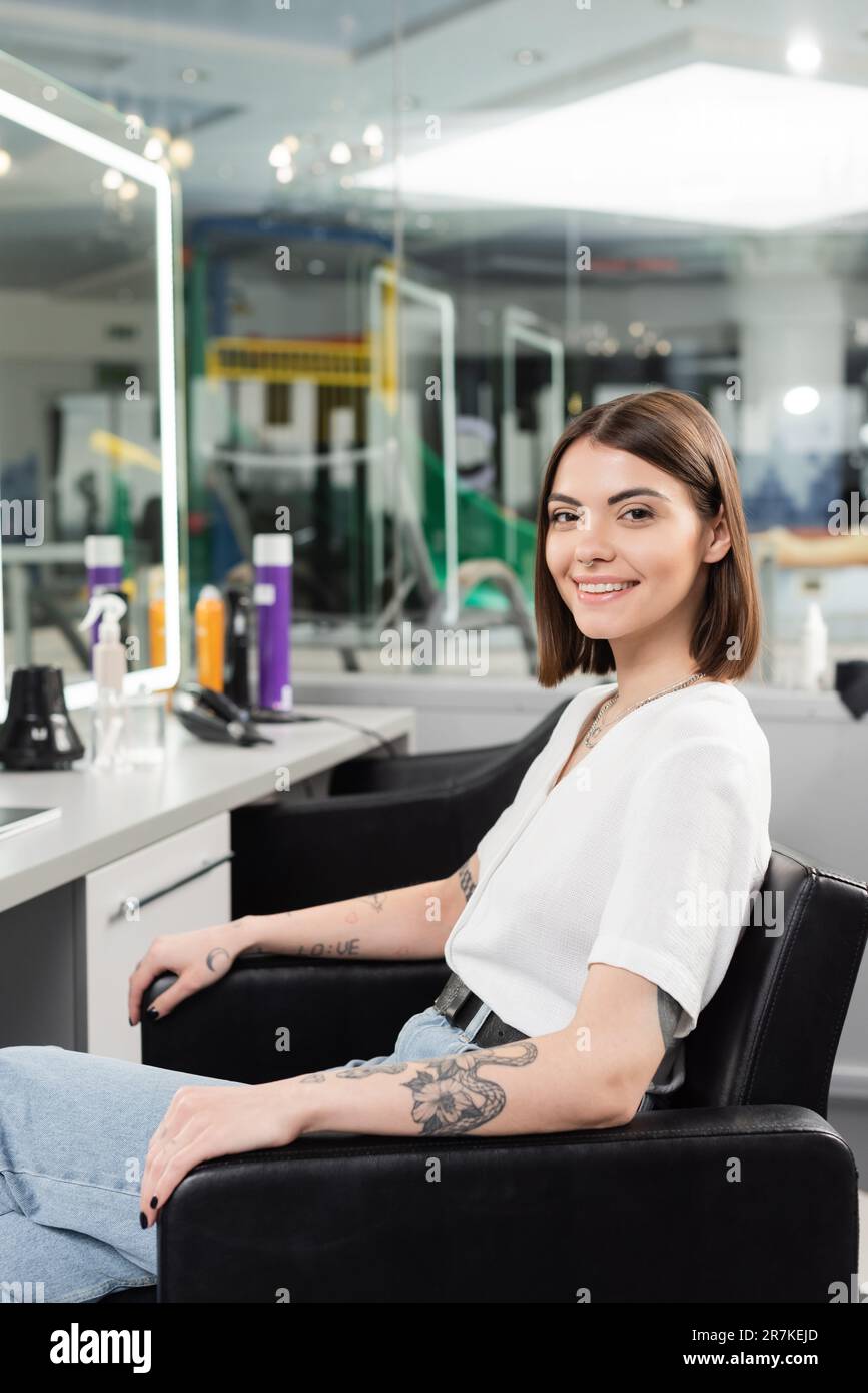 Woman in hairdresser chair hi-res stock photography and images - Alamy