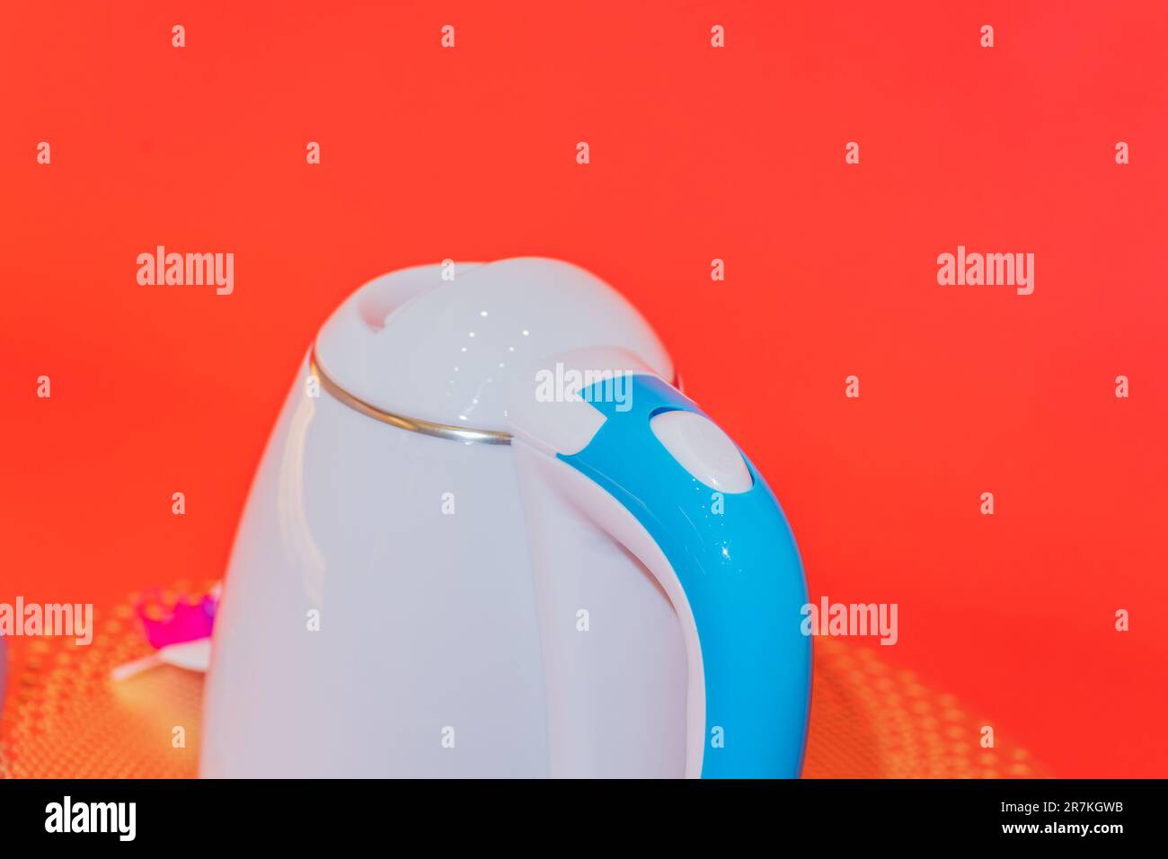 The White and Blue Electric Hot Water Kettle combines efficiency and