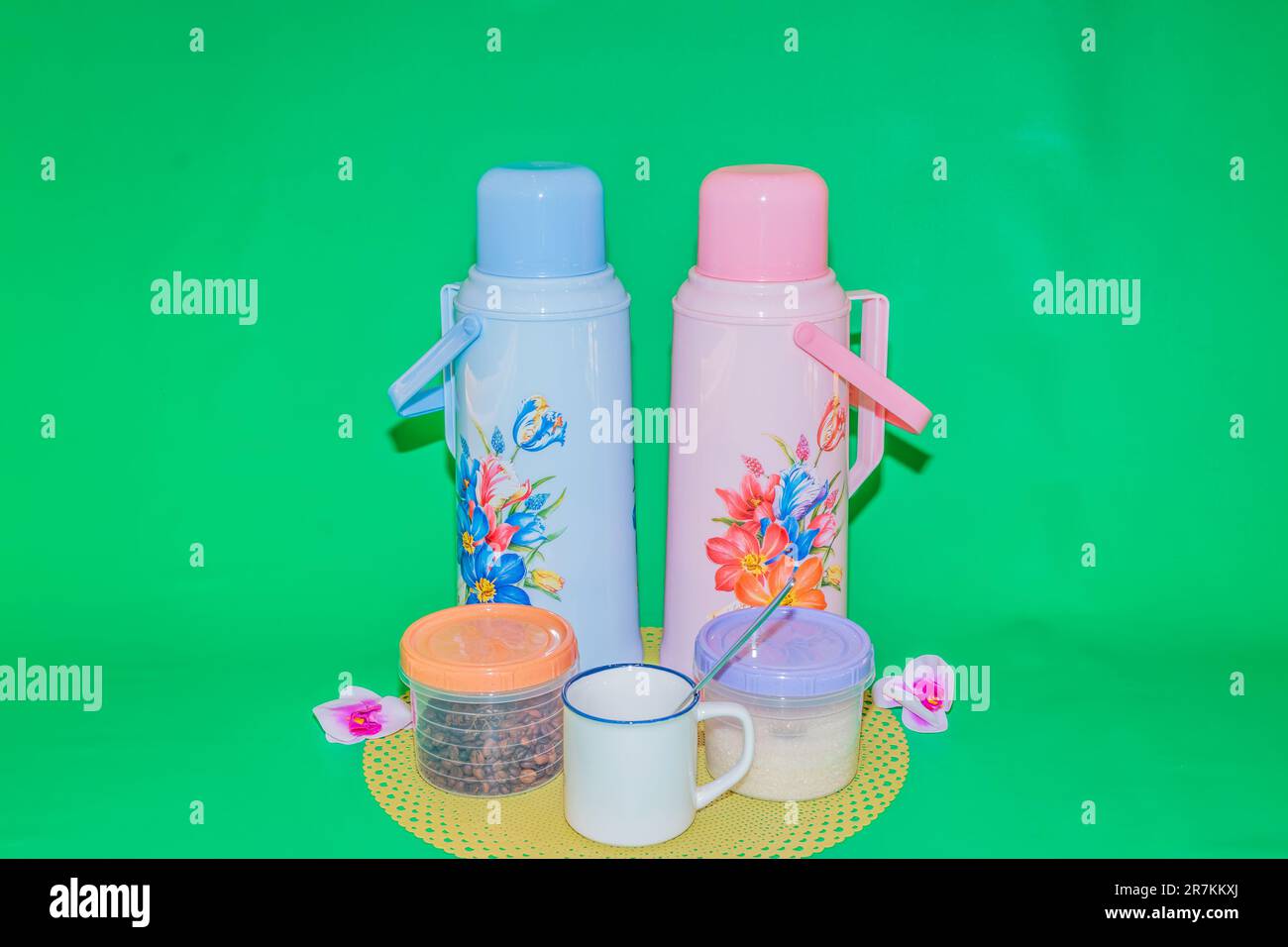 https://c8.alamy.com/comp/2R7KKXJ/the-hot-water-thermos-pink-and-blue-dual-tone-beverage-container-is-a-stylish-and-practical-accessory-for-keeping-your-drinks-hot-on-the-go-2R7KKXJ.jpg