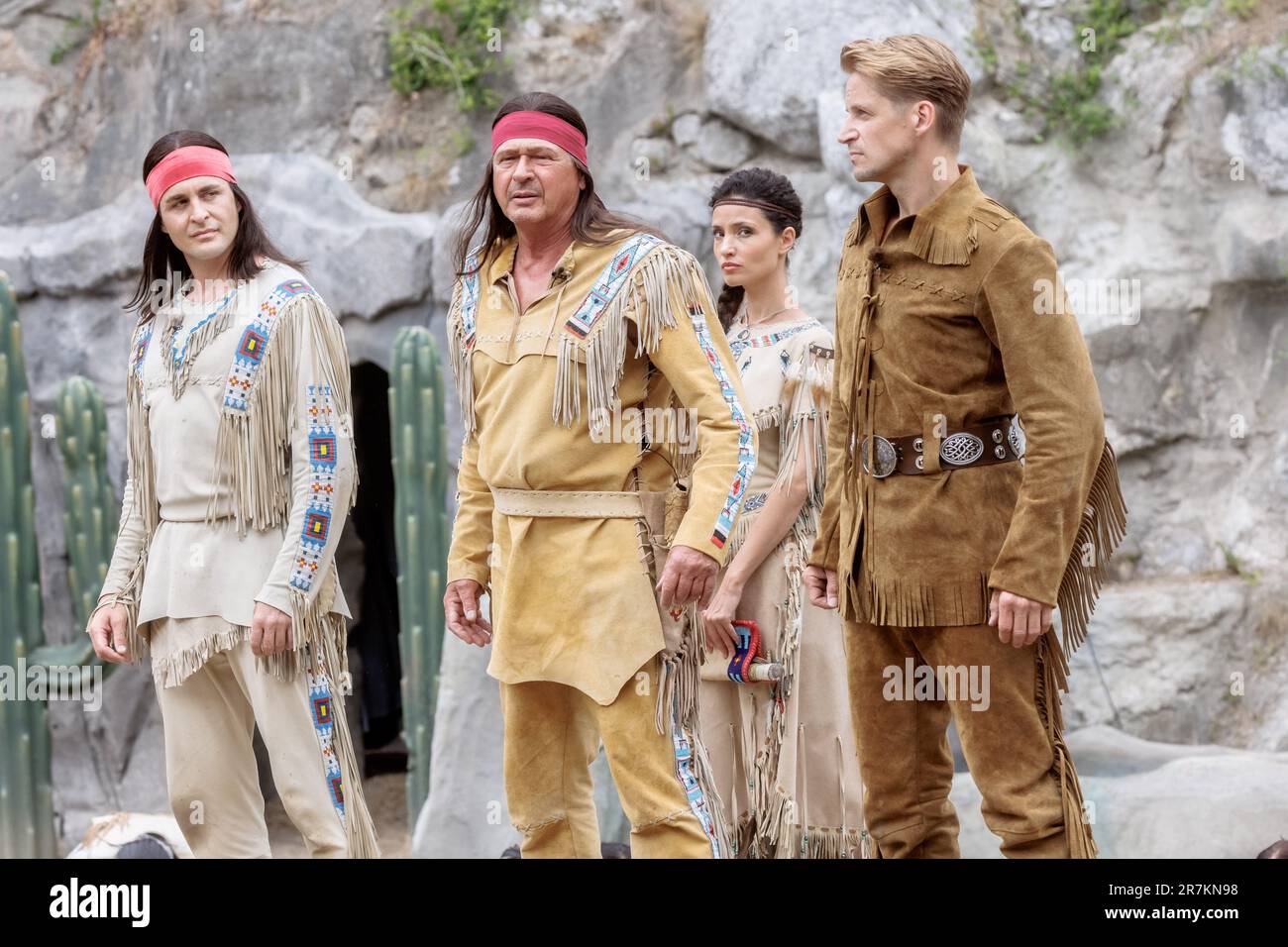 Bad Segeberg, Germany. 16th June, 2023. The actors (l-r) Alexander Klaws as Winnetou, Joshy Peters as Intschu-tschuna, Nadine Menz as Nscho-tschi and Bastian Semm as Old Shatterhand and play at the photo rehearsal for the new production of the Karl May Games 'Winnetou I - Blood Brothers'. The play celebrates its premiere on June 24 at the open-air theater at Kalkberg. Credit: Markus Scholz/dpa/Alamy Live News Stock Photo