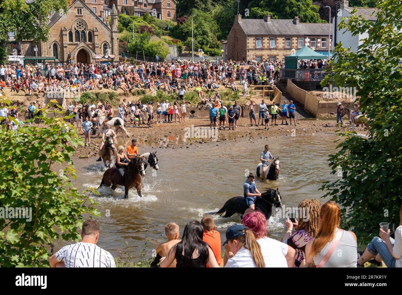 Appleby Horse Fair tradition of the gypsy and traveller community washing their horses in the River Eden on Appleby-in-Westmorland, UK. Stock Photo