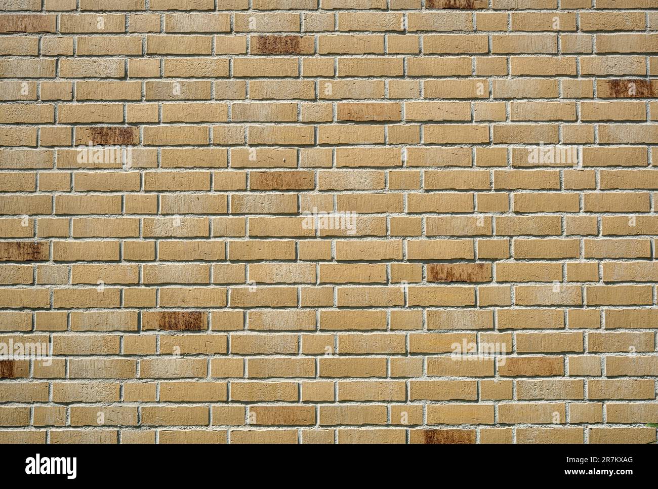 Background from a wall made of beige clinker bricks Stock Photo