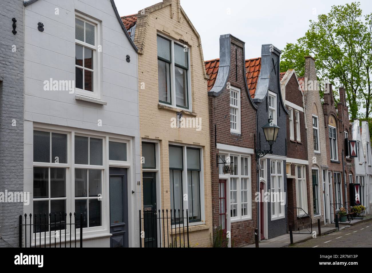 Walking In Old Dutch Town Zierikzee With Old Small Houses And Narrow Walking In Old Dutch Town Zierikzee With Old Small Houses And Narrow