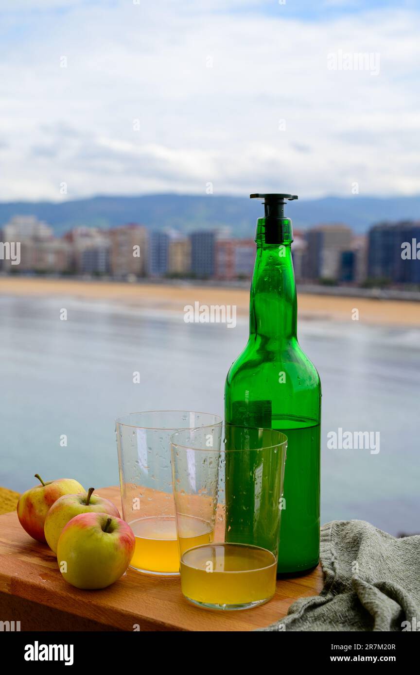 Traditional natural Asturian cider made from fermented apples in wooden