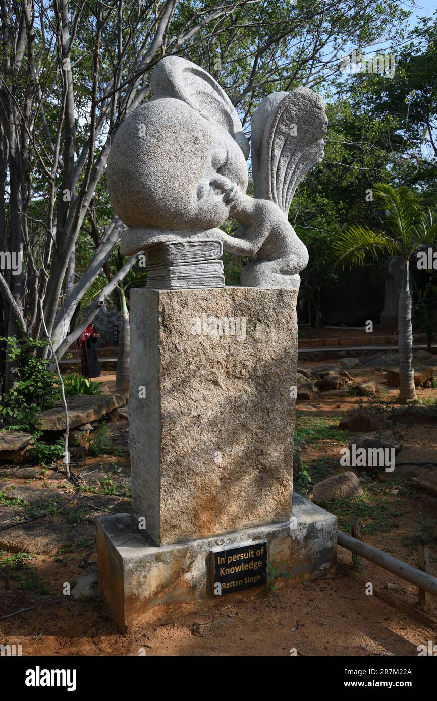 In Persuit Of Knowledge. Stone sculpture by Rattan Singh. Shilparamam