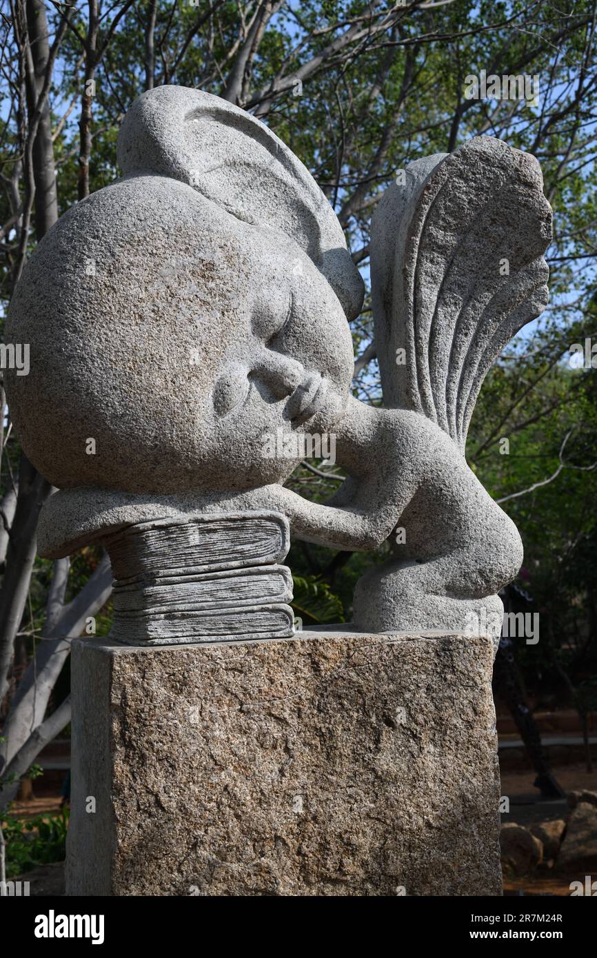 In Persuit Of Knowledge. Stone sculpture by Rattan Singh. Shilparamam