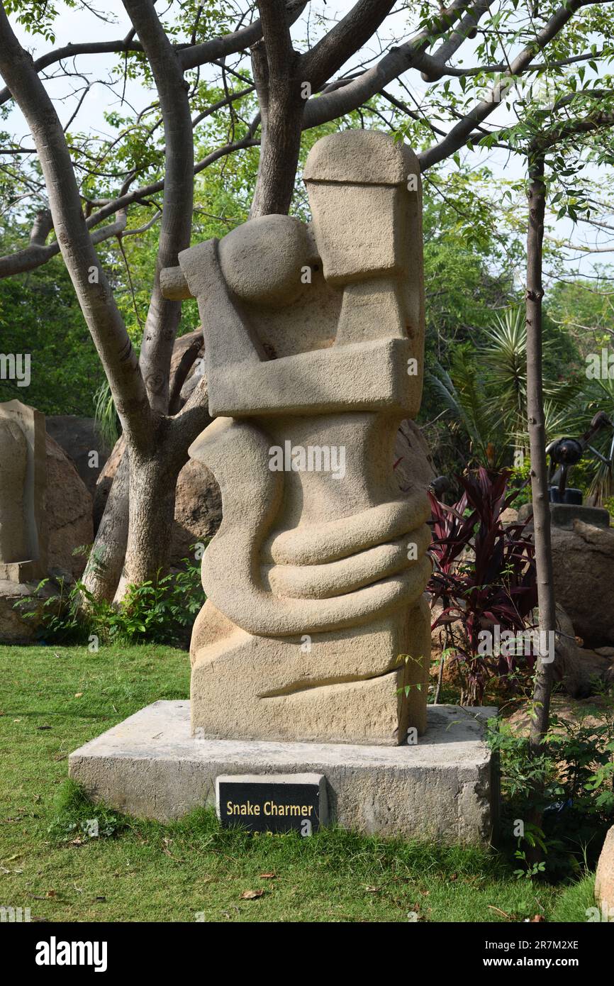 Snake Charmer. Stone sculpture. Shilparamam Sculpture Park, Hyderabad