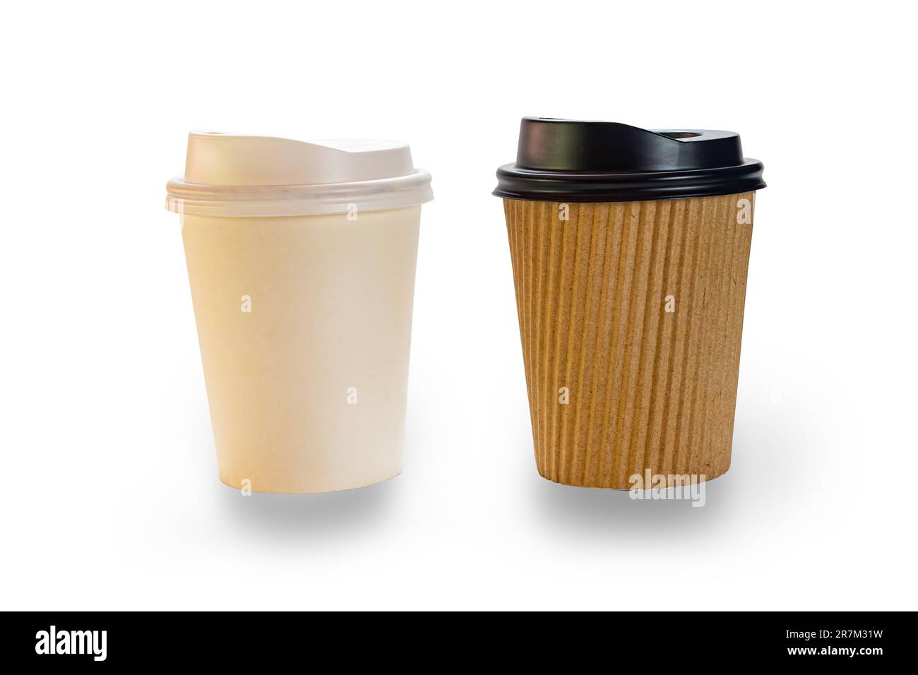 Side view of two empty paper coffee cups, smooth white cup with white lid and brown corrugated with black lid, isolated on white background with clipp Stock Photo