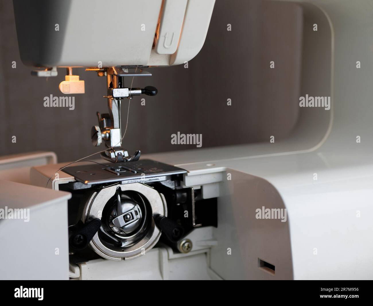 Sewing machine bobbin case hi-res stock photography and images - Alamy