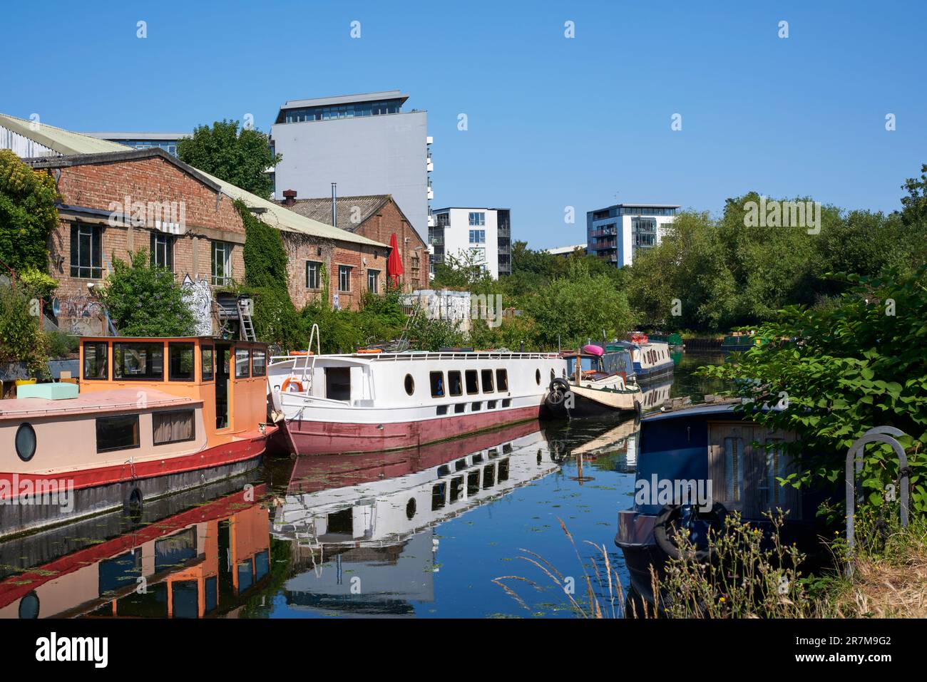 The River Lea Navigation in summertime, between Bow and Hackney Wick, East London UK Stock Photo