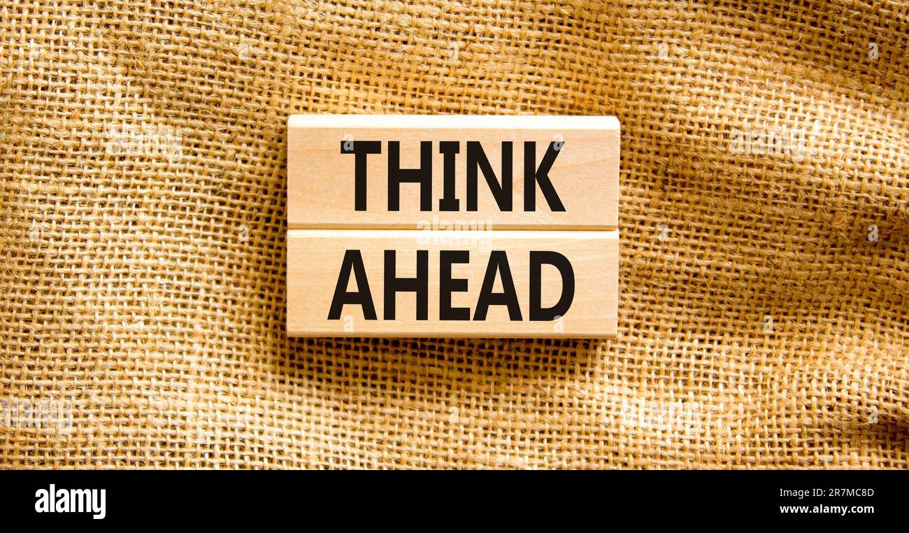 Think ahead symbol. Concept words Think ahead on wooden blocks on a