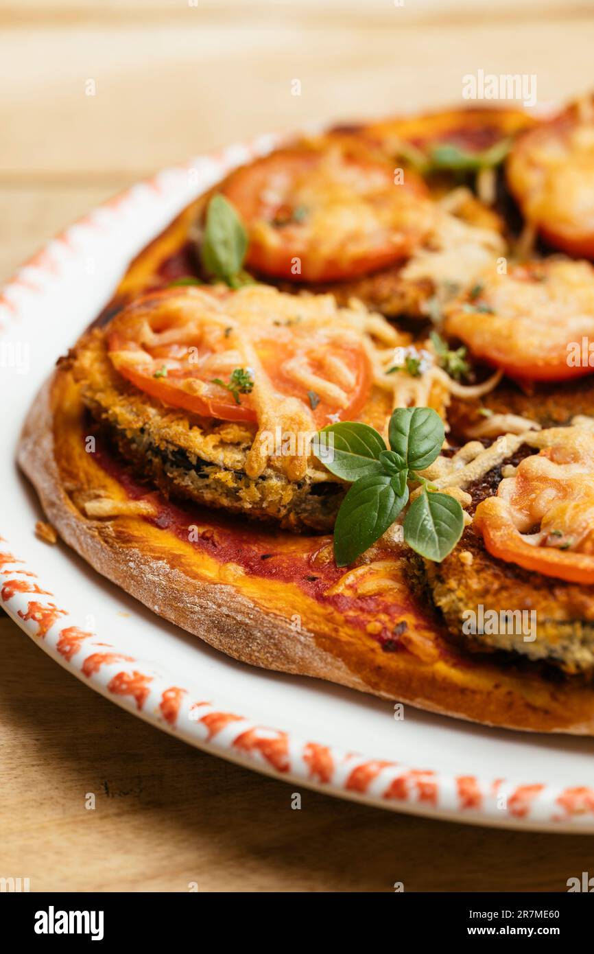 Home made vegan breaded eggplant pizza Stock Photo Alamy