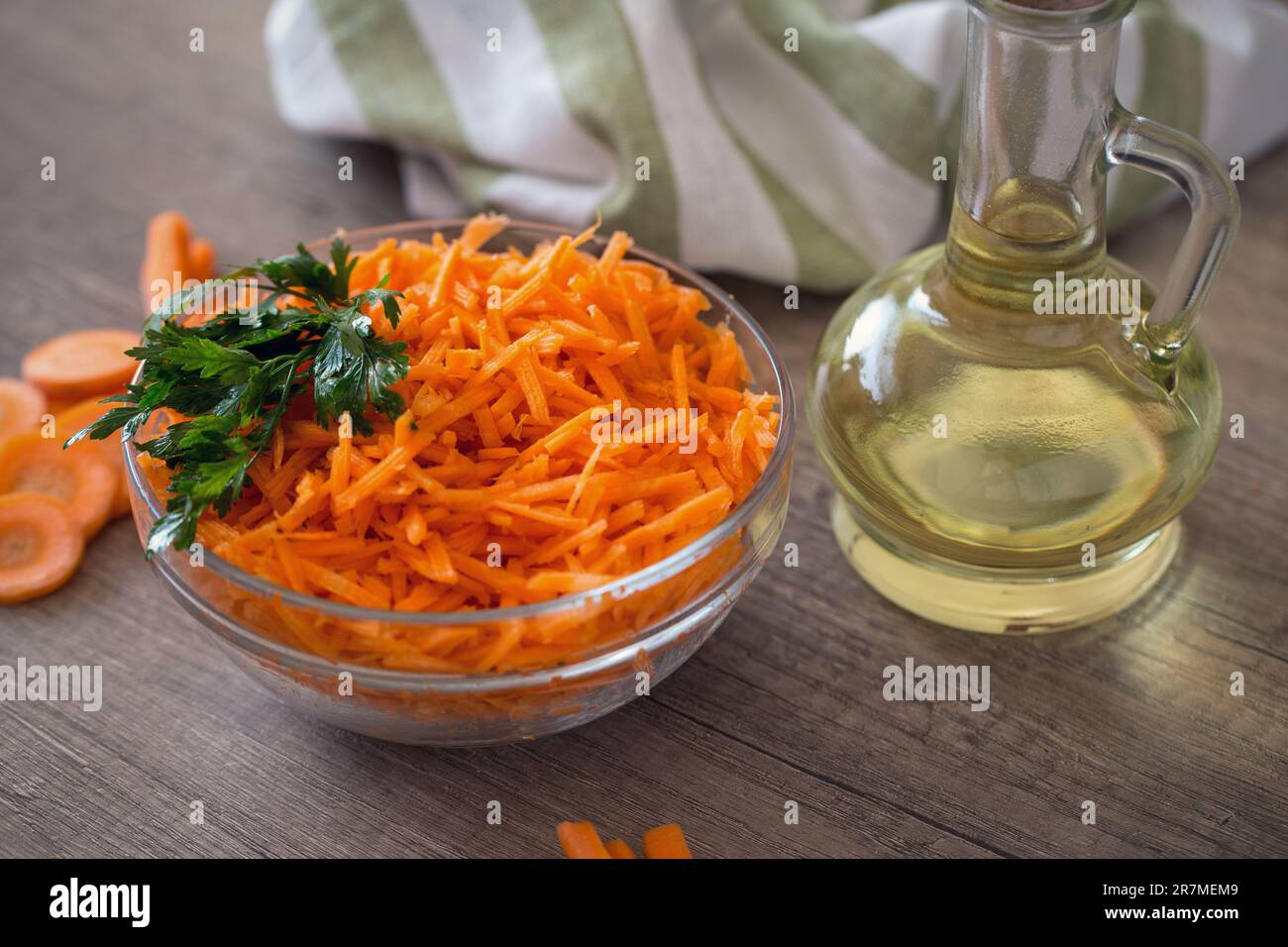 healthy salad with fresh carrot and oil Stock Photo