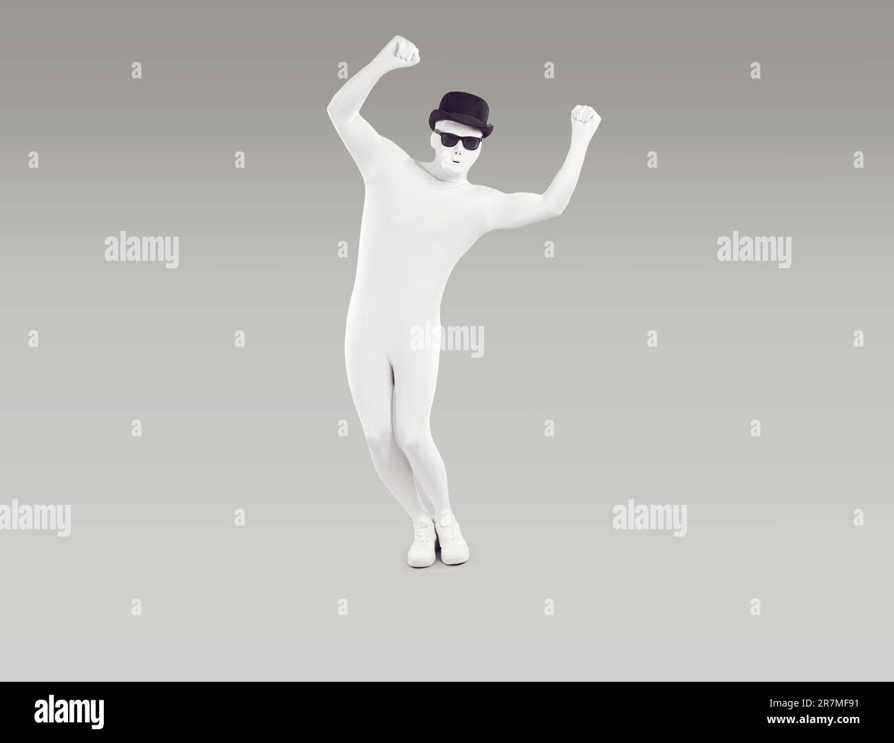 Unknown person dressed in white leotard dancing with his hands raised Stock Photo