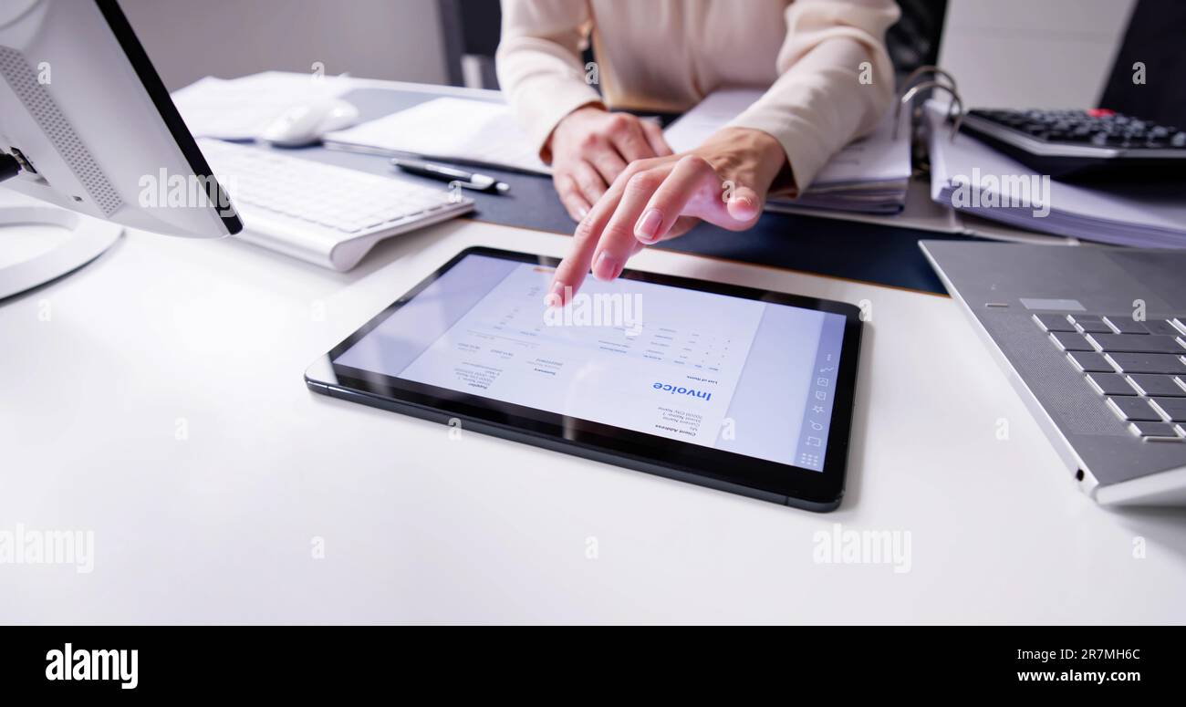 E Invoice On Tablet. Online Electronic Bill Management Stock Photo