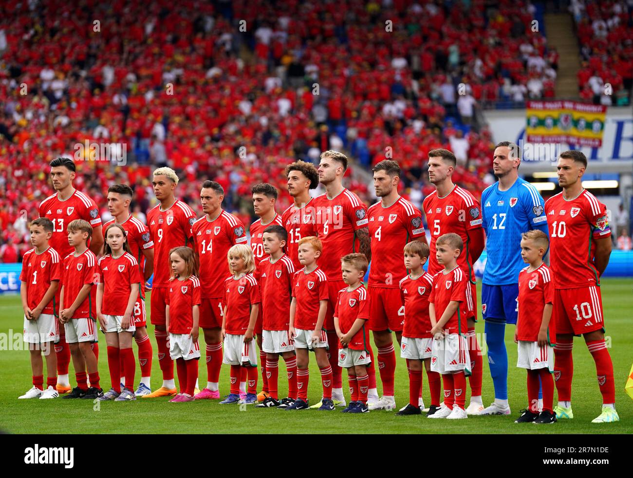 Wales players line up on the pitch ahead of the UEFA Euro 2024