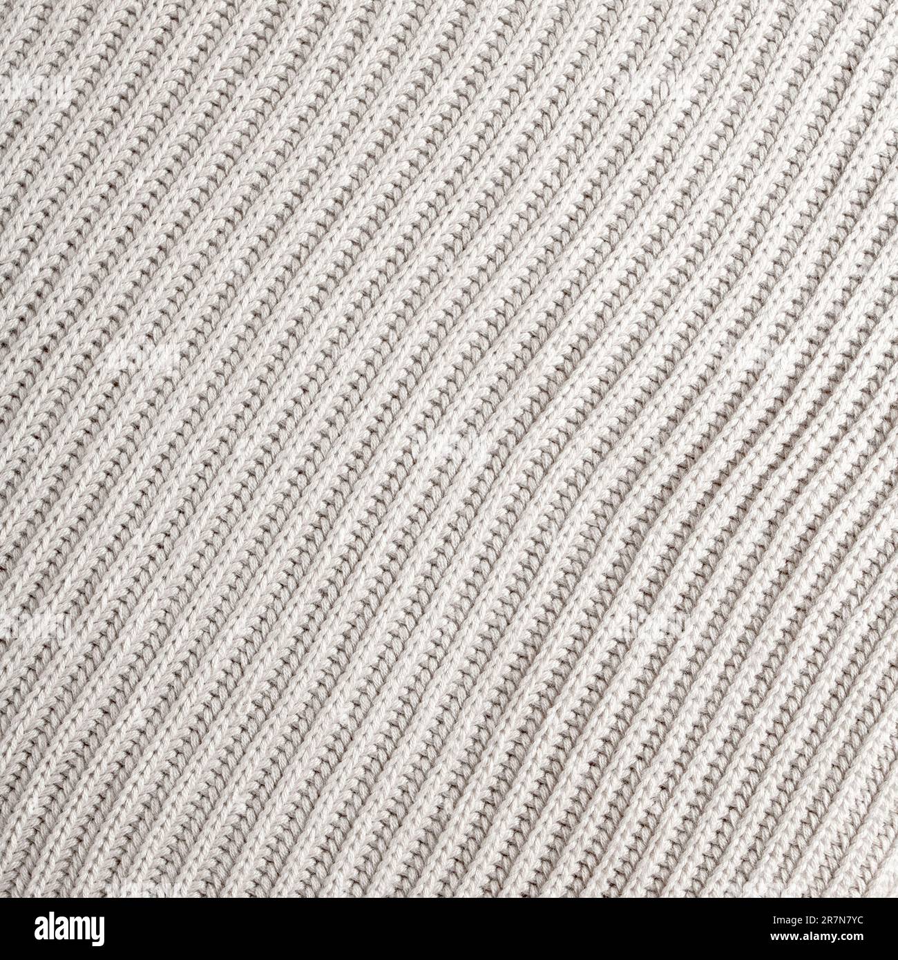 Knitted background.Texture of rough knitting from white diagonal woolen ...