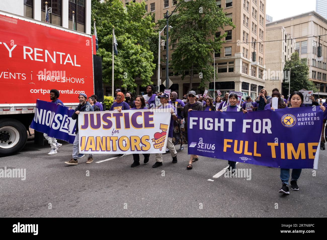 Seattle, USA. 16 Jun, 2023. Mid-day SEIU6 Janitors Union marches through the city to protest at the Amazon Campus. Workers around the country are calling for more help and higher pay as corporate profits rise and inflation hits workers further eating away at their paychecks. James Anderson/Alamy Live News Stock Photo