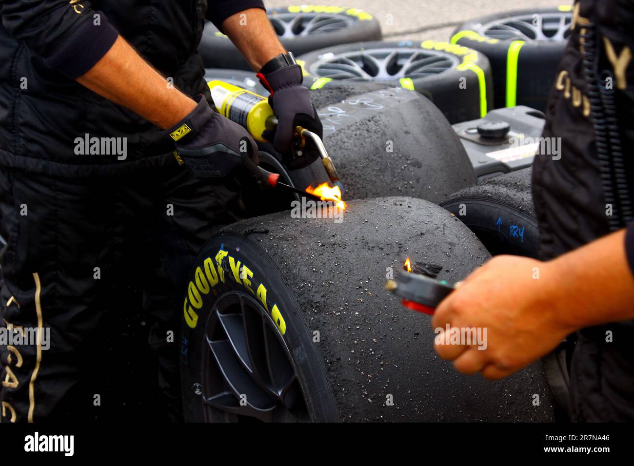 Madison, IL USA - June 4, 2023: World Wide Technology Raceway, NASCAR, 'Enjoy Illinois 300' Crew cleaning tire. Stock Photo