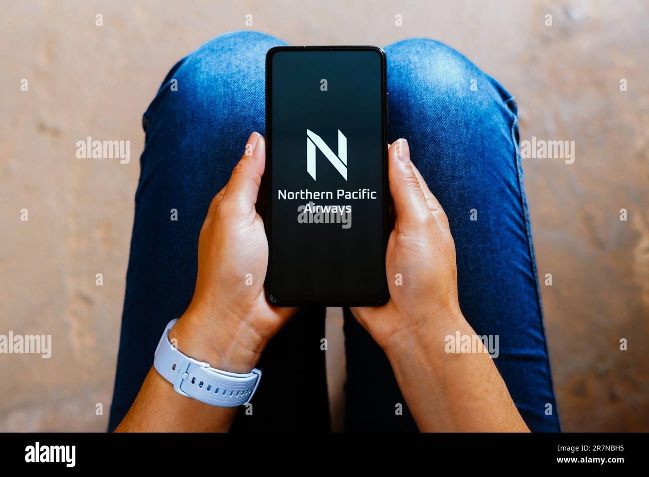 In this photo illustration, the Northern Pacific Airways (NPA) logo is  displayed on a smartphone screen Stock Photo - Alamy, image size:1300x956