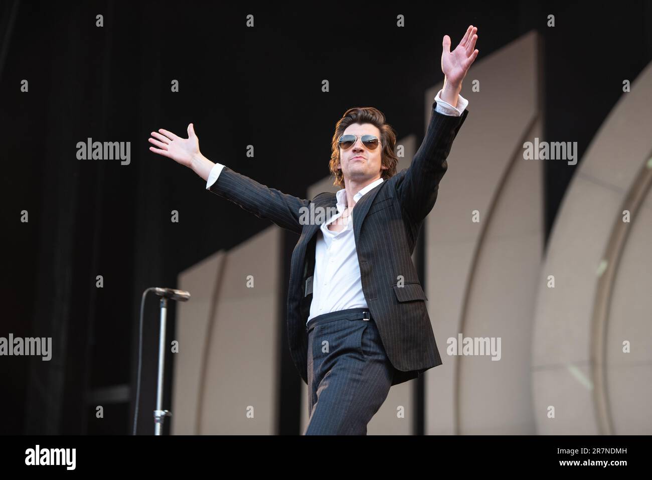 Alex Turner of Arctic Monkeys performs during the first of three nights at The Emirates Stadium, London. Credit: John Barry/Alamy Live News Stock Photo