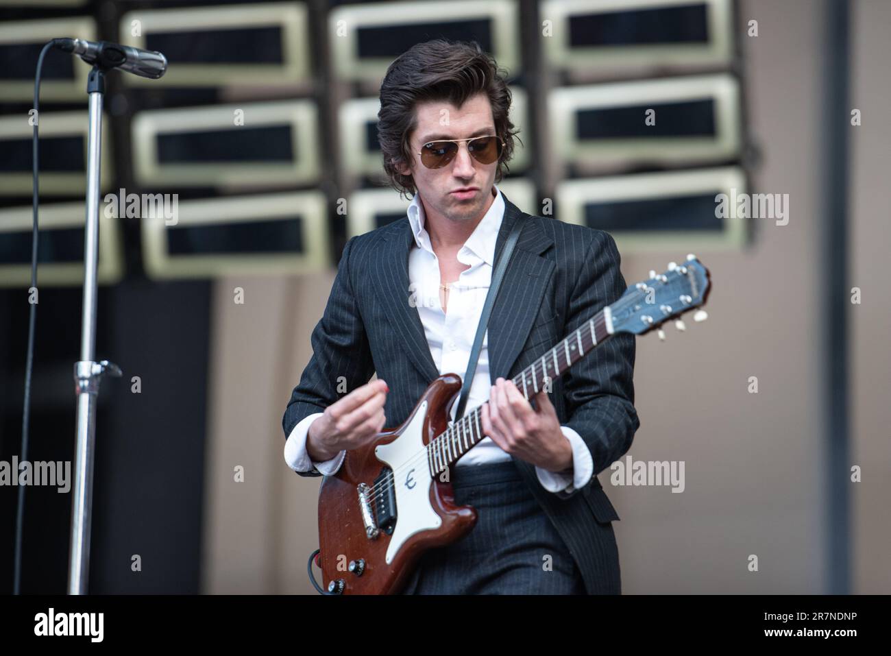 Alex Turner of Arctic Monkeys performs during the first of three nights at The Emirates Stadium, London. Credit: John Barry/Alamy Live News Stock Photo