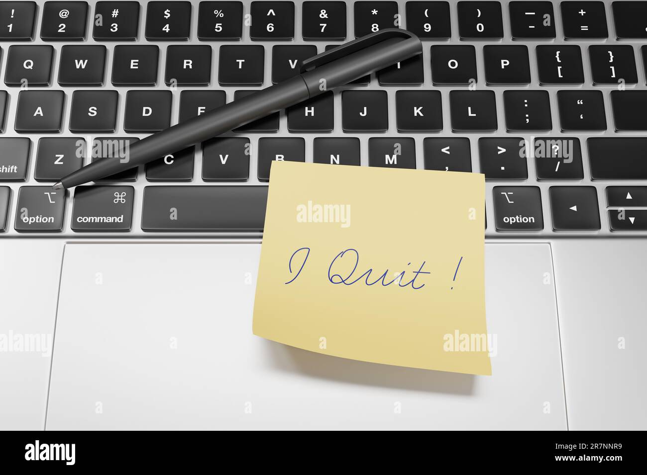 Ball pen and a yellow sticky note written with I Quit on a silver laptop. Illustration of the concept of quitting job on the spot Stock Photo