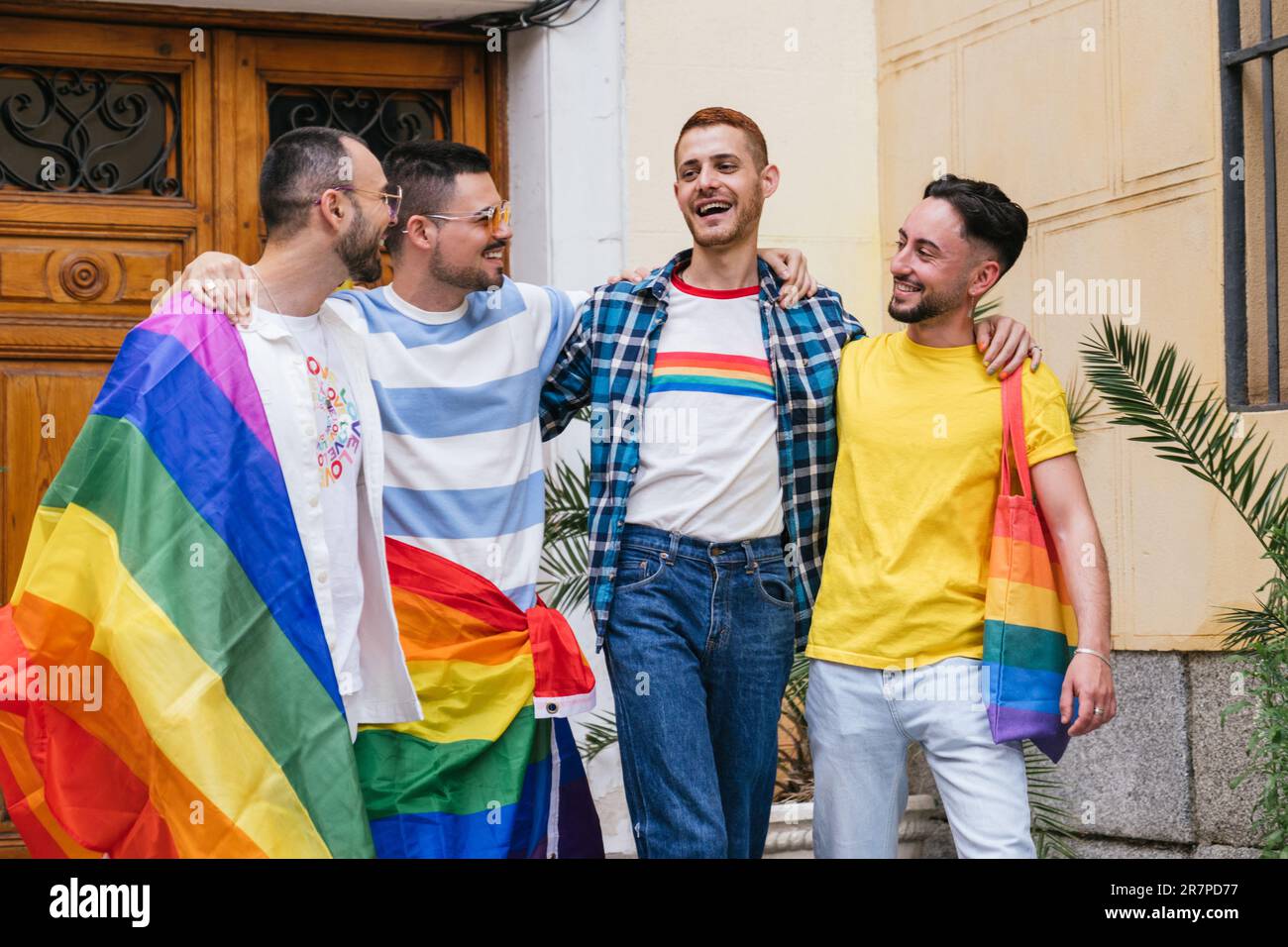 Vibrant Quartet: Joyful Gay Friends Embrace, Flaunting LGBTQ Pride with ...
