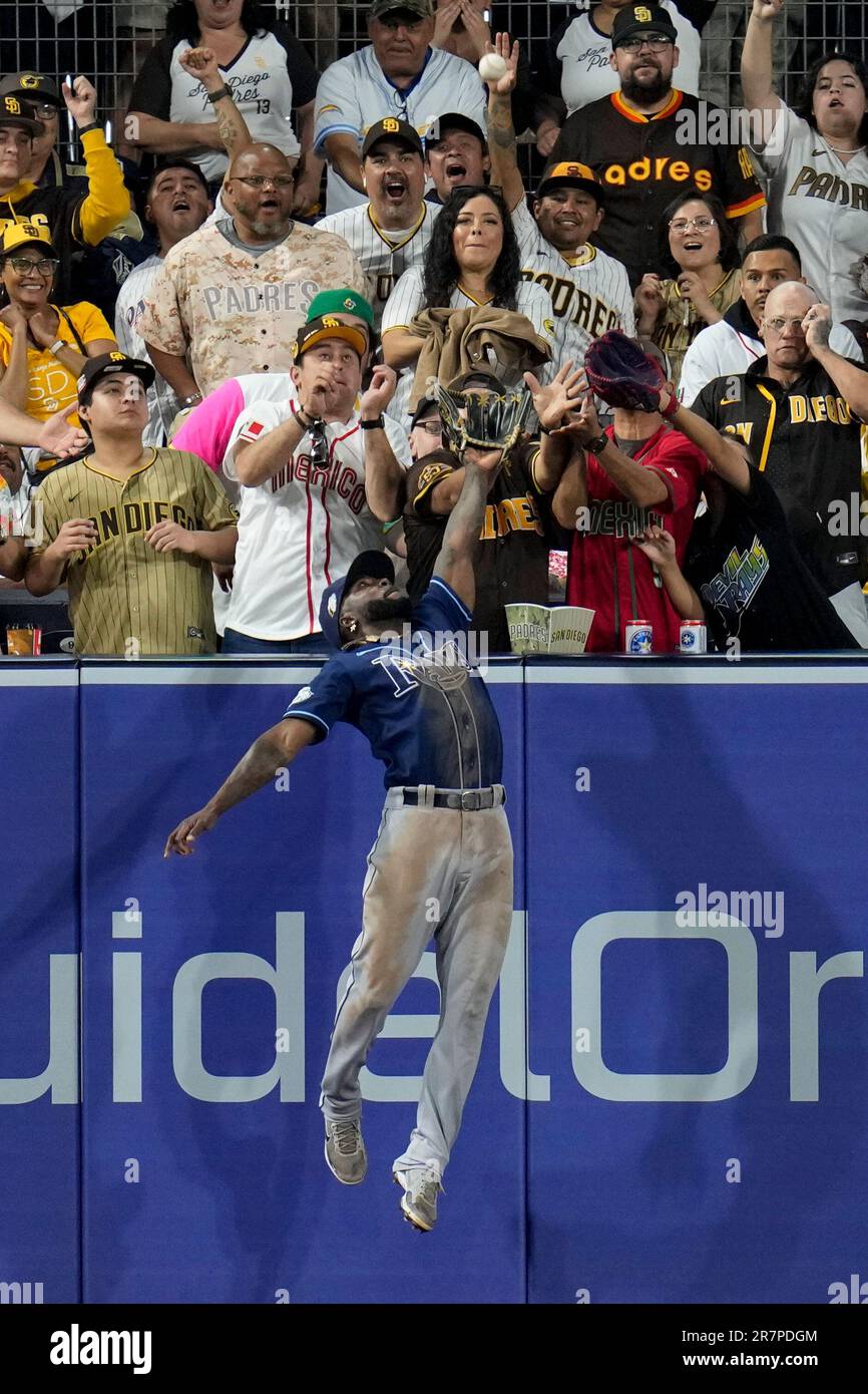 Tampa Bay Rays left fielder Randy Arozarena can't reach a home run hit