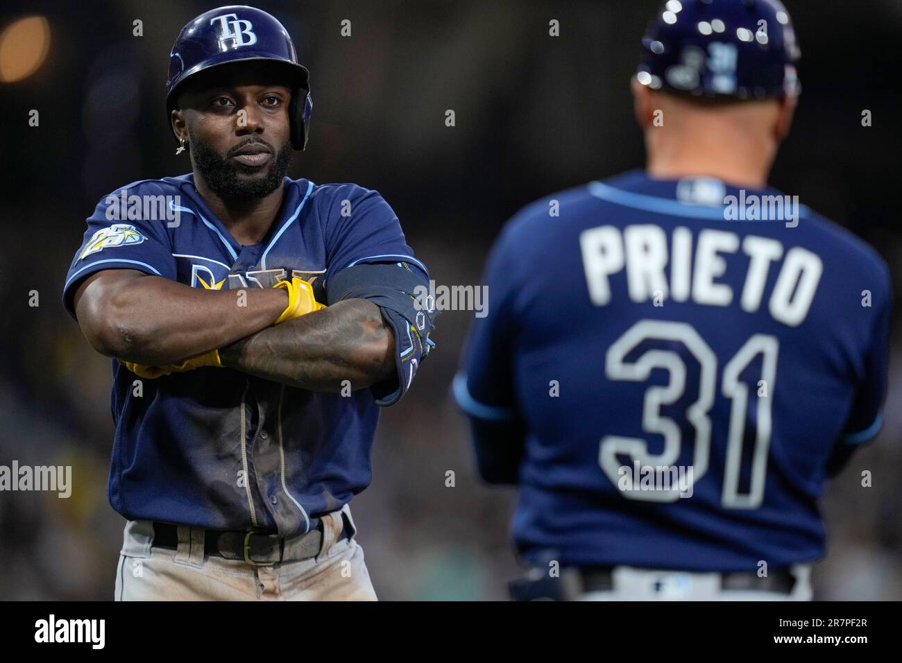 Tampa Bay Rays' Randy Arozarena, left, celebrates with first base coach