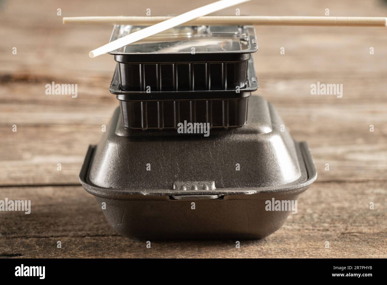 plastic packaging for sushi delivery from a restaurant on a table close-up Stock Photo