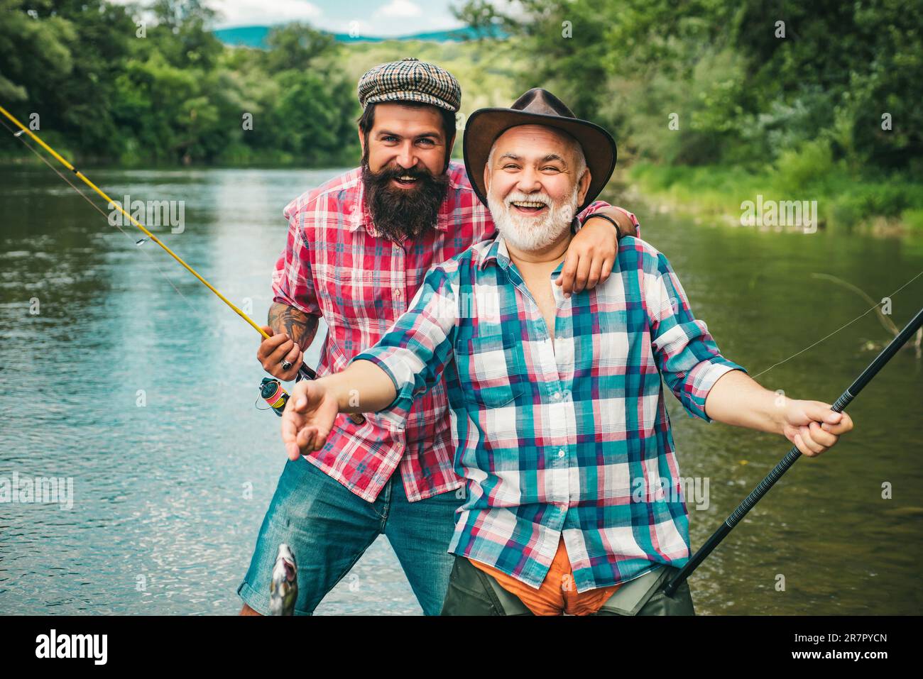 Difference between fly fishing and regular fishing. Happy father and