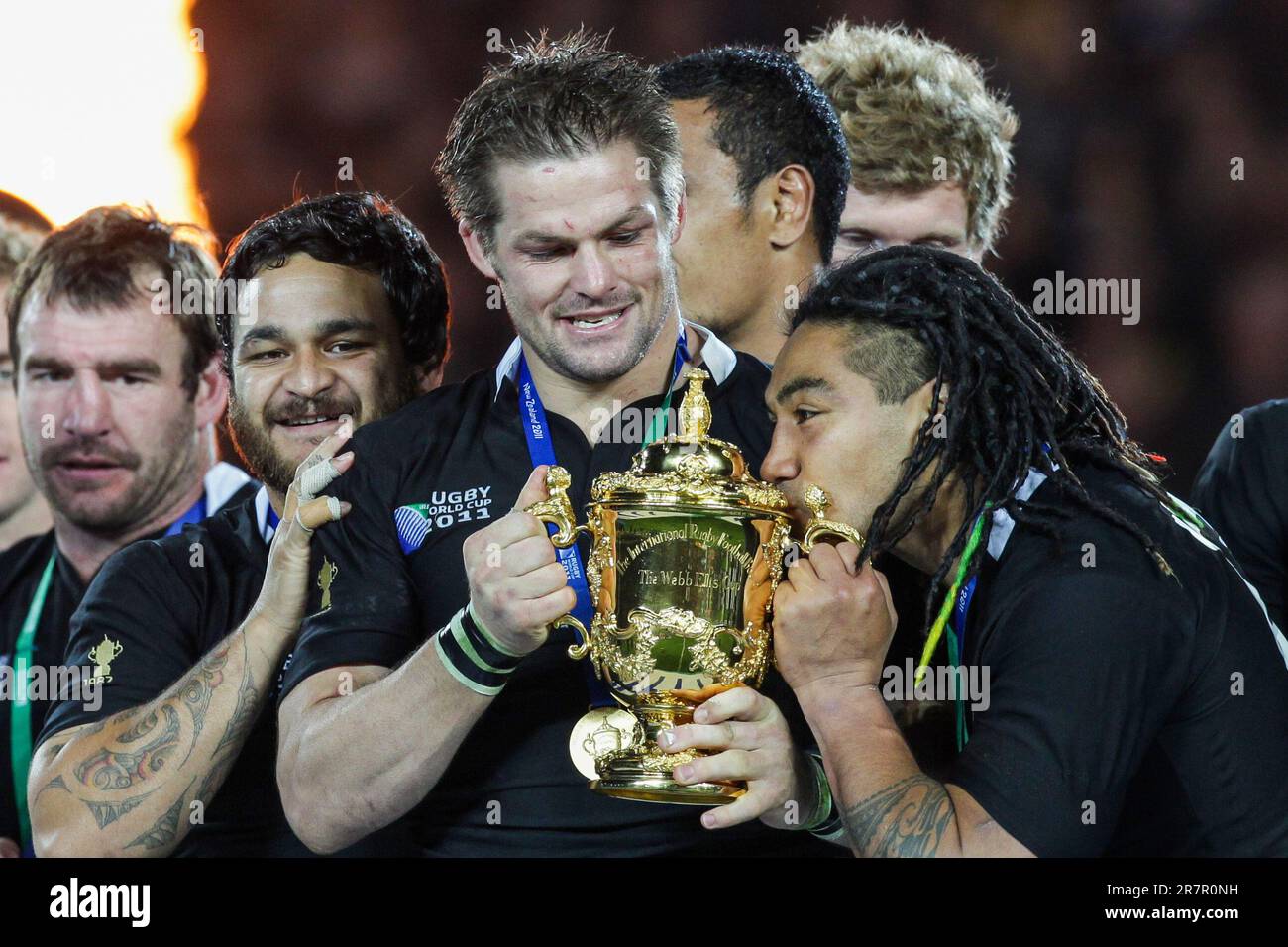 New Zealand’s captain Richie McCaw holds the cup with Pipi Weepu and Ma’a Nonu after defeating France in the Rugby World Cup final at Eden Park, Auckland, New Zealand, Sunday, October 23, 2011. Stock Photo