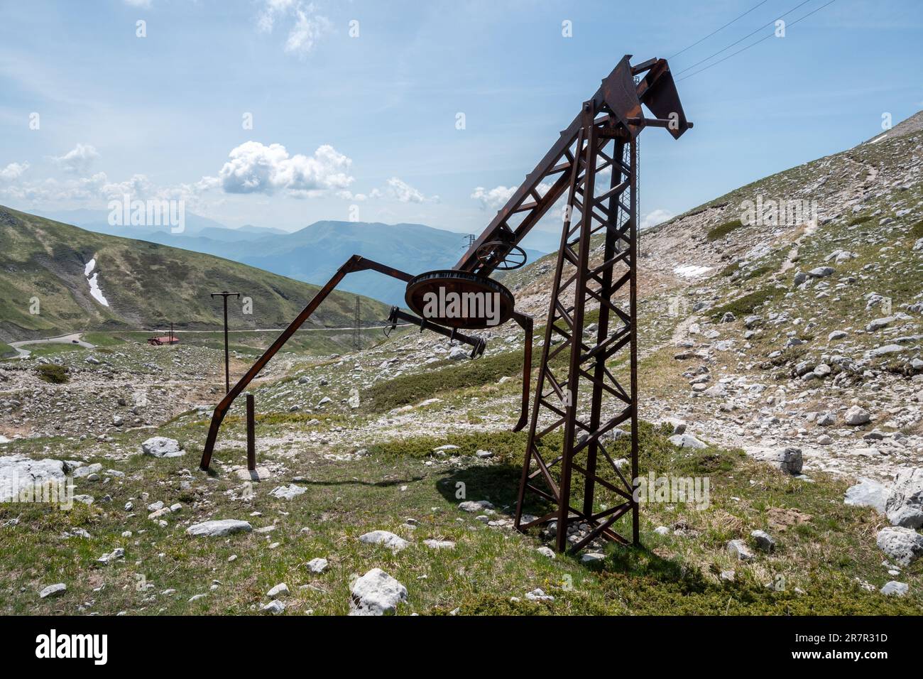 Old disused and rusty ski lift on Monte Terminillo in the Apennines, Lazio, Italy, Europe. Theme, global warming, climate change Stock Photo
