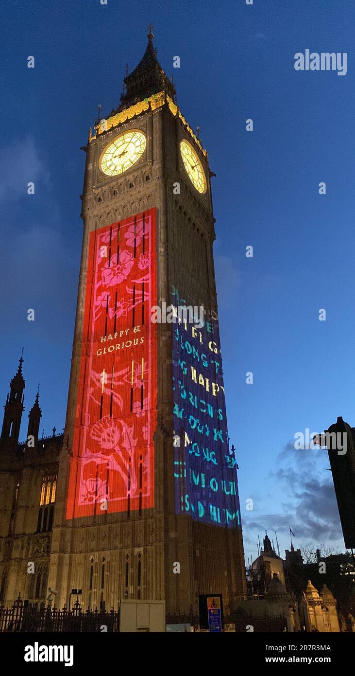 Big Ben lit up to celebrate the Coronation of King Charles . Big Ben was lit up with images projected onto the tower in Westminster central London as a tribute to the King ... Stock Photo