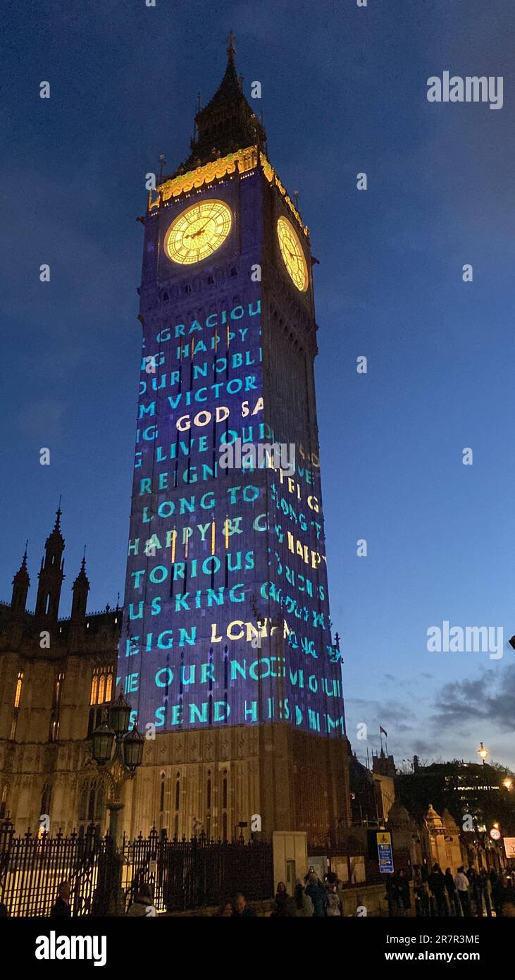 Big Ben lit up to celebrate the Coronation of King Charles . Big Ben was lit up with images projected onto the tower in Westminster central London as a tribute to the King ... Stock Photo