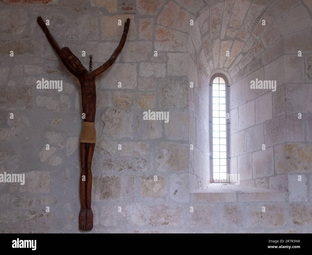 Modern looking crucifix of Saint-Sernin-du-Bosc chapel near Lauzerte, Southwest France Stock Photo