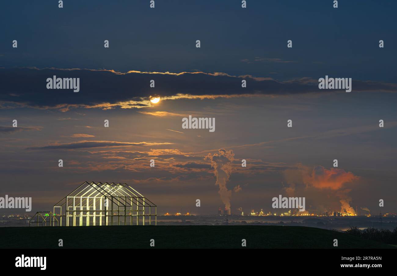 NEUKIRCHEN-VLYN, GERMANY - MAY 5, 2023: Norddeutschland tip, landmark of Ruhr Metropolis against night sky with moon on May 5, 2023 in Neukirchen-Vlyn Stock Photo