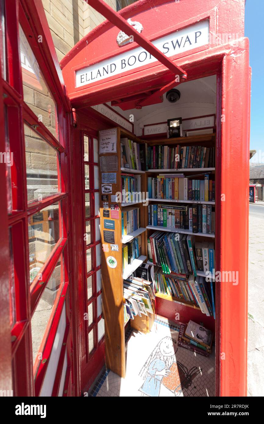 Book swap telephone box, Elland, West Yorkshire Stock Photo