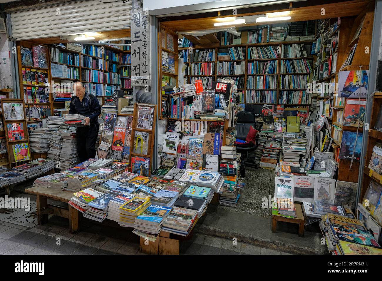 Busan, South Korea - May 26, 2023: A book seller on Bosu-dong Book Street, it is a famous book selling street in Busan, South Korea. Stock Photo