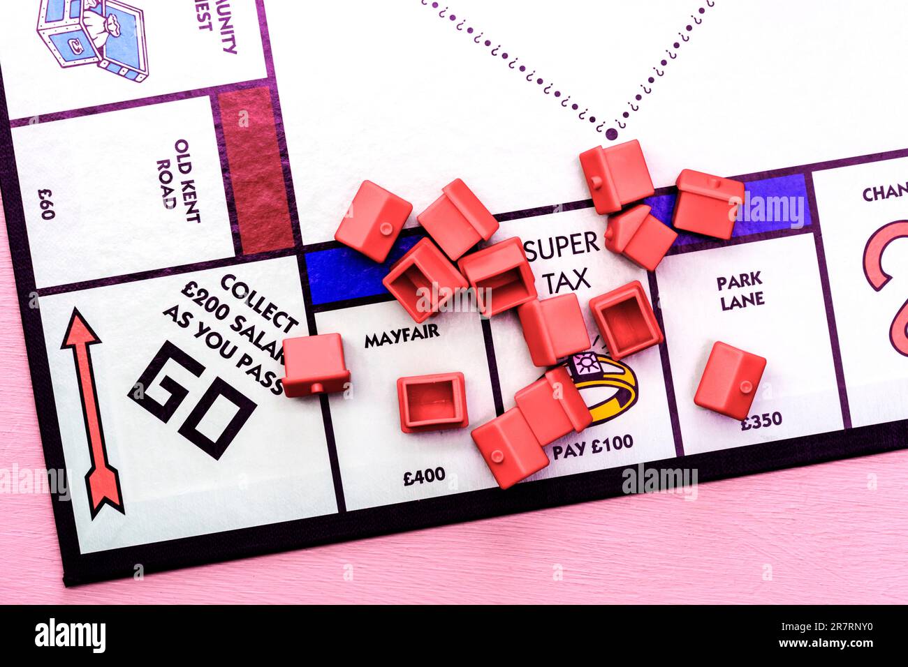 Monopoly board showing scattered hotels on Super Tax, Mayfair and Park