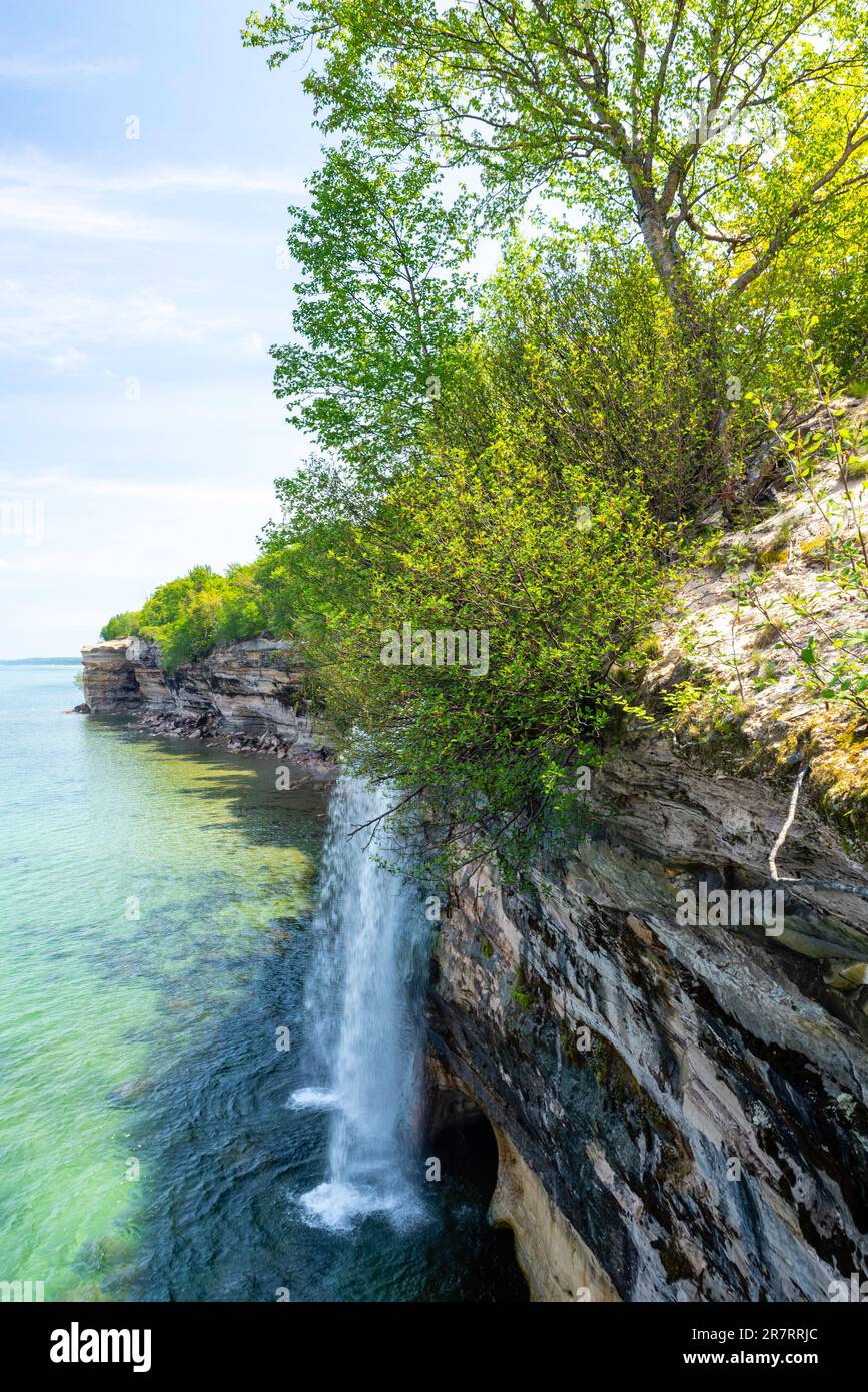 Photograph of Spray Falls while on a morning hike, Pictured Rocks National Lakeshore, Munising, MIchigan, USA. Stock Photo