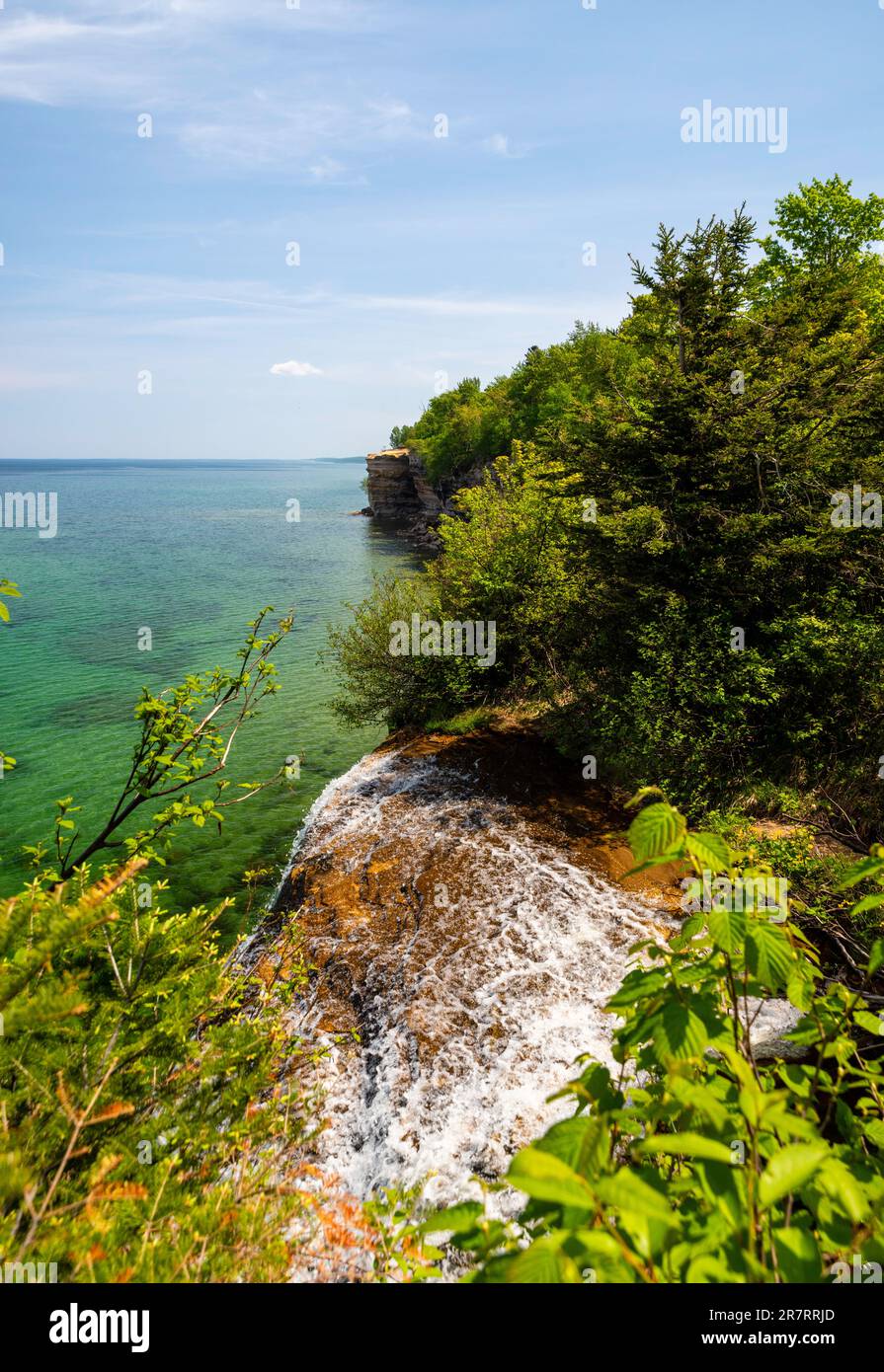 Photograph of the top of Spray Falls while on a morning hike, Pictured Rocks National Lakeshore, Munising, MIchigan, USA. Stock Photo