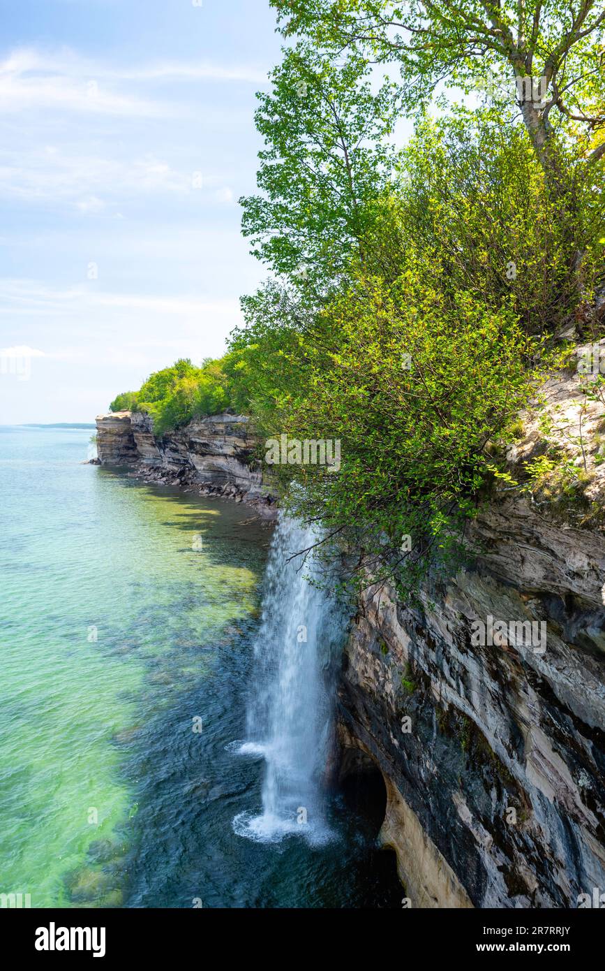 Photograph of Spray Falls while on a morning hike, Pictured Rocks National Lakeshore, Munising, MIchigan, USA. Stock Photo