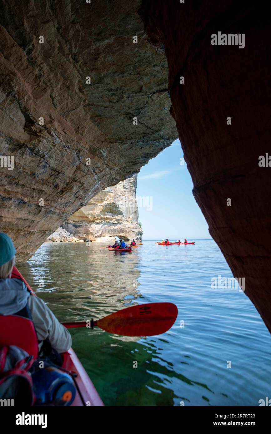 Negotiating Limbo Cave. Exploring with a kayak, Pictured Rocks National