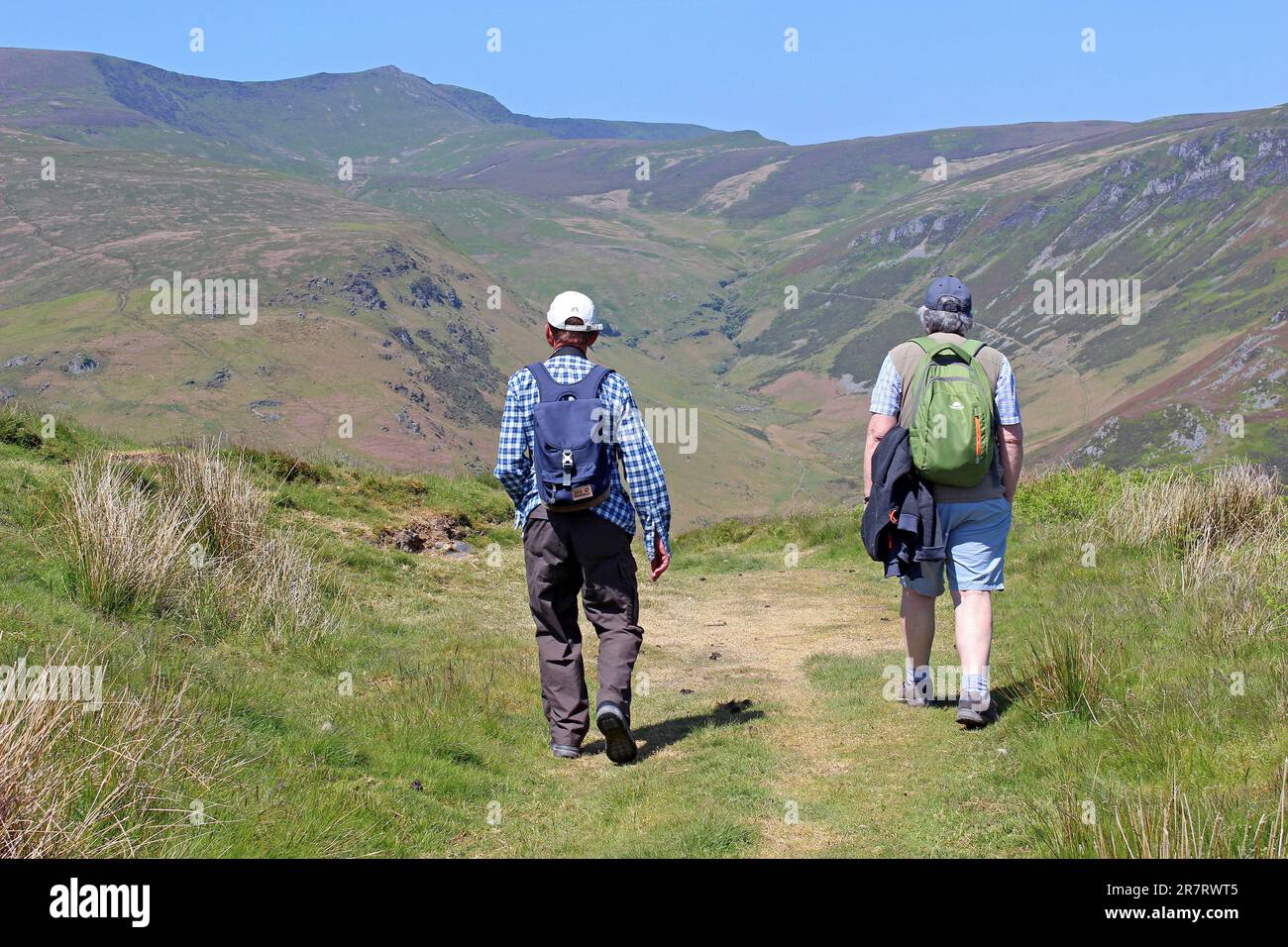 Two Senior Men Walking In The Berwyns, Llanrhaeadr Ym Mochnant, Powys, Wales Stock Photo